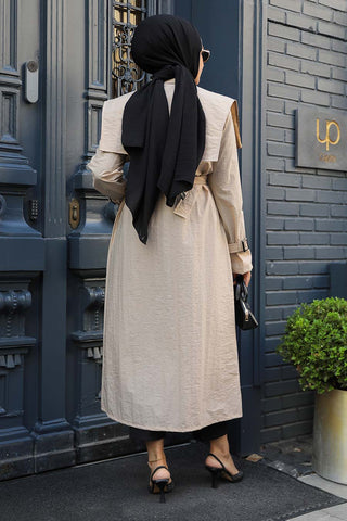 The Molly Full-Length Trench Coat redefines elegance and versatility in modest fashion