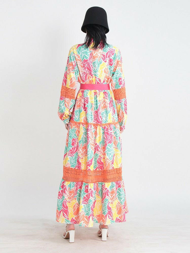 Women Stand Collar Printed Long Sleeve Tiered Maxi Dress.