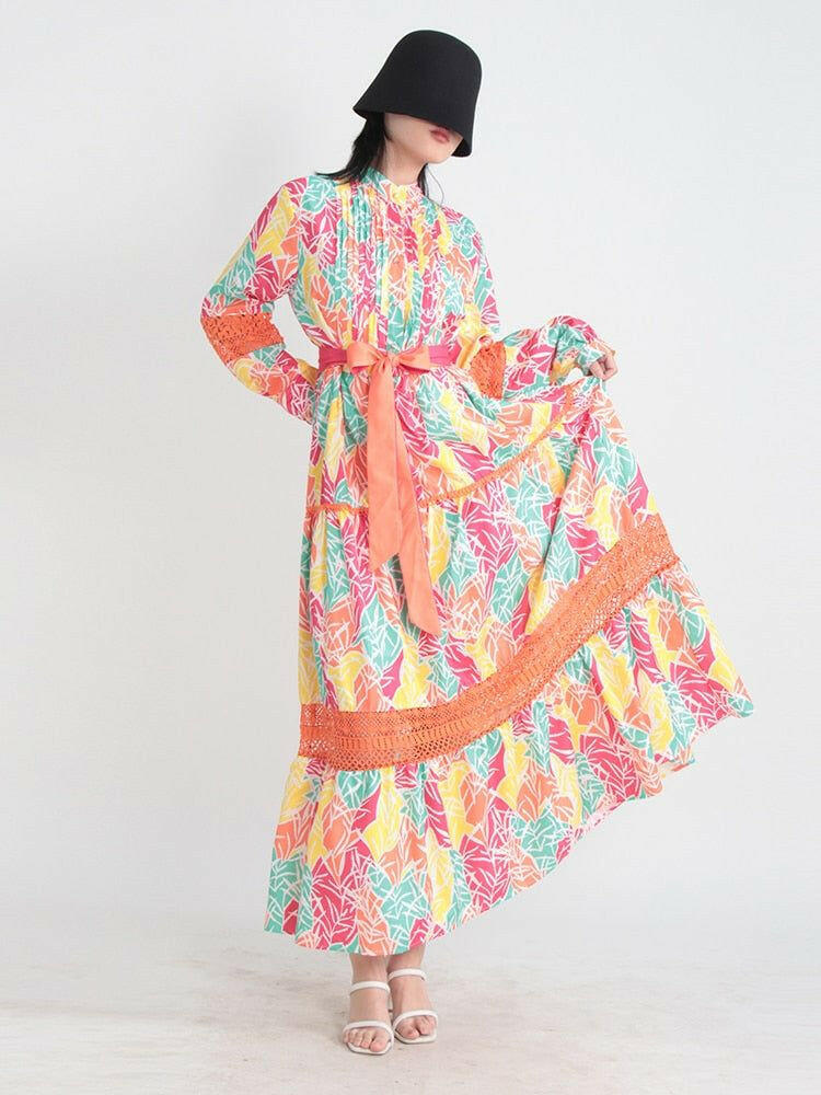 Women Stand Collar Printed Long Sleeve Tiered Maxi Dress.