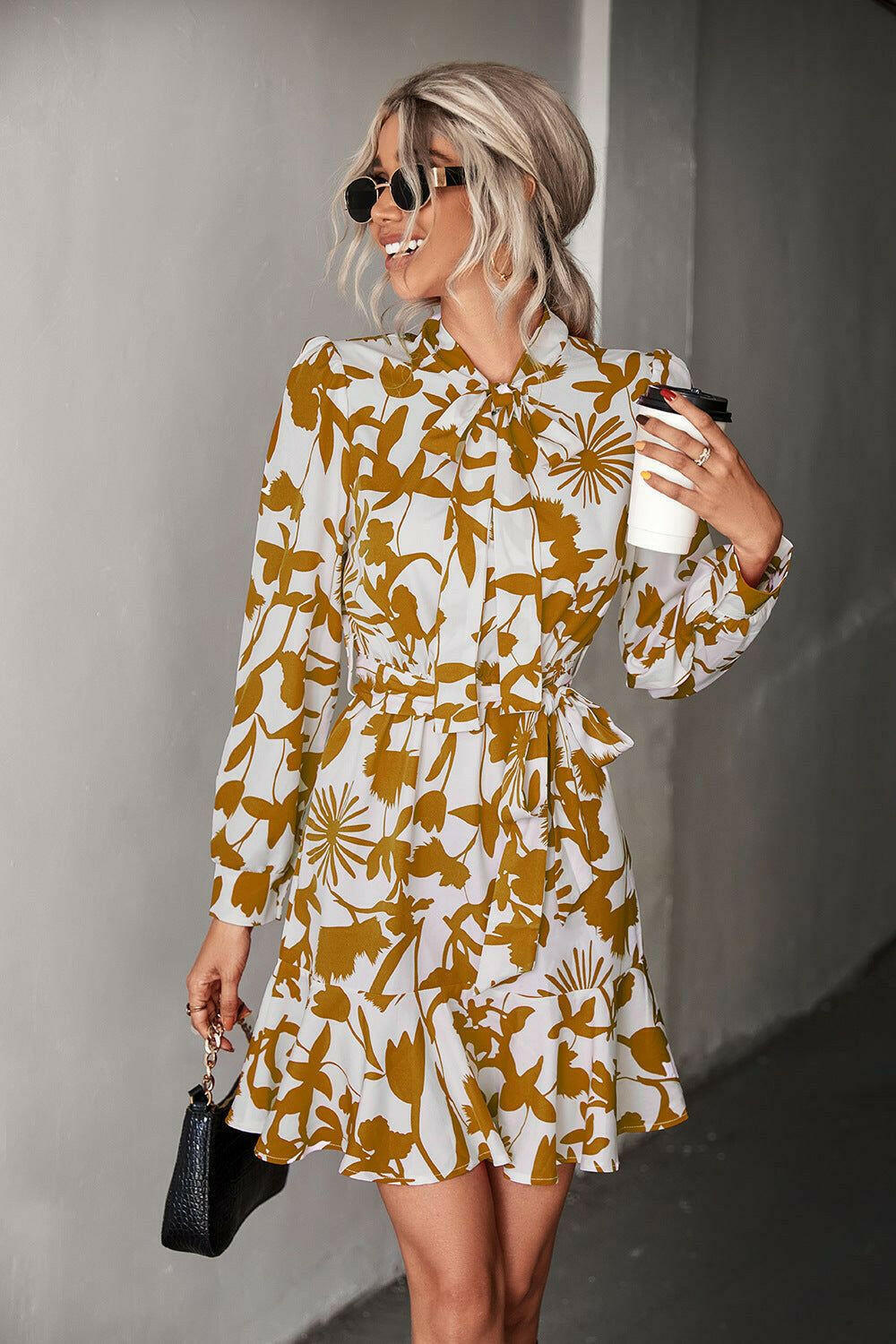 Floral Tie Neck Belted Puff Sleeve Dress.