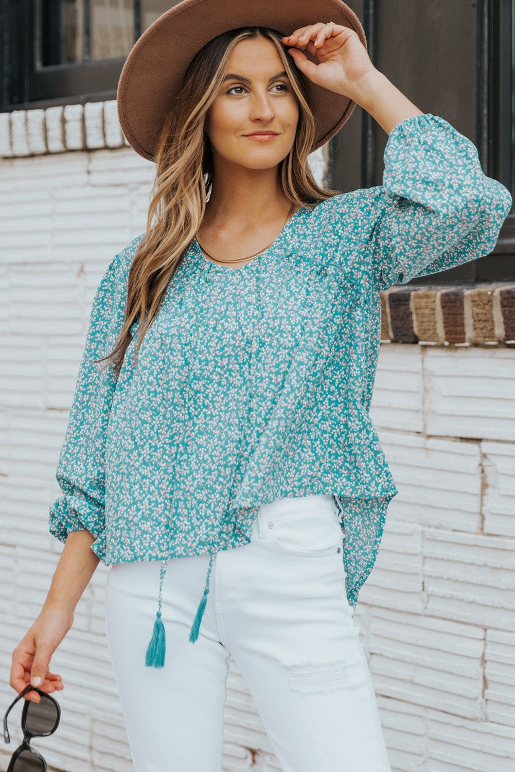 Ditsy Floral Tassel Tie High-Low Blouse.