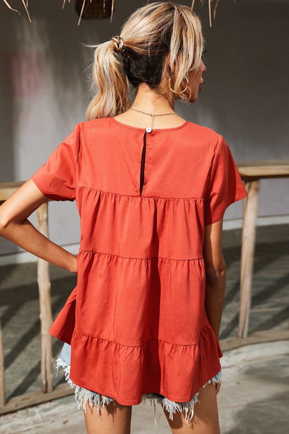 Round Neck Short Sleeve Tiered Blouse.