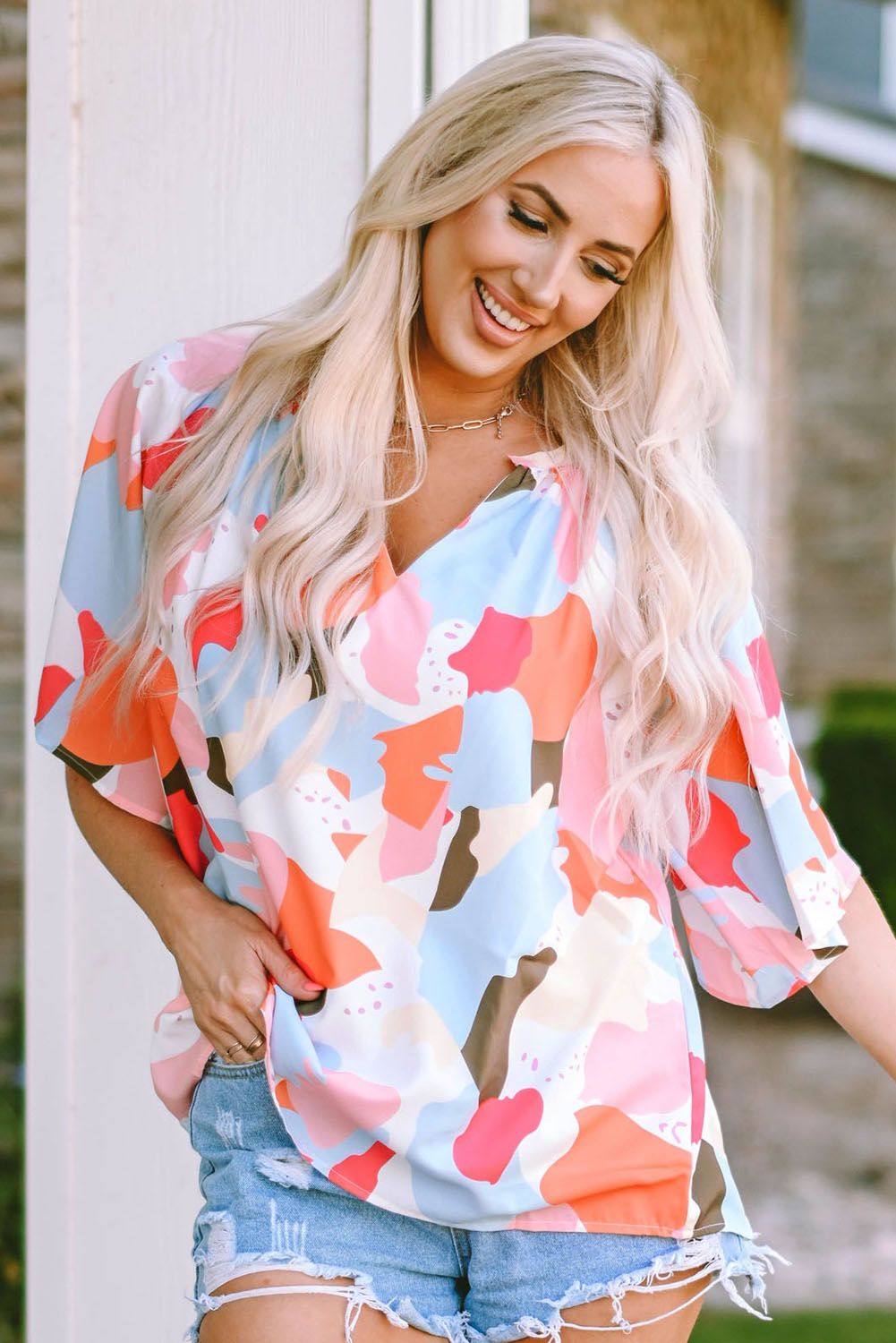 Printed Notched Neck Half Sleeve Blouse.